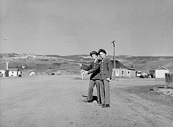 Servicemen hitchhiking in Kremmling, 1944
