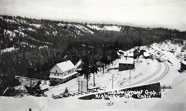 A winter view of the town of Emigrant Gap from Route 40.  ca. 1930.